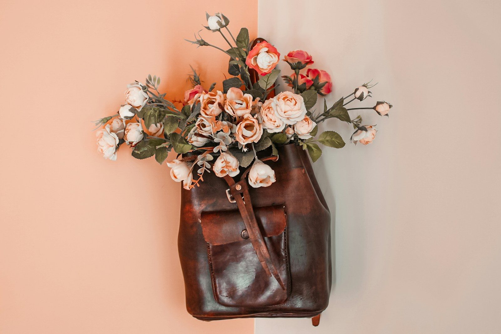 a brown bag with a bunch of flowers in it